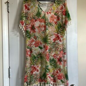 L/XL swim suit cover up.  Very tropical looking.